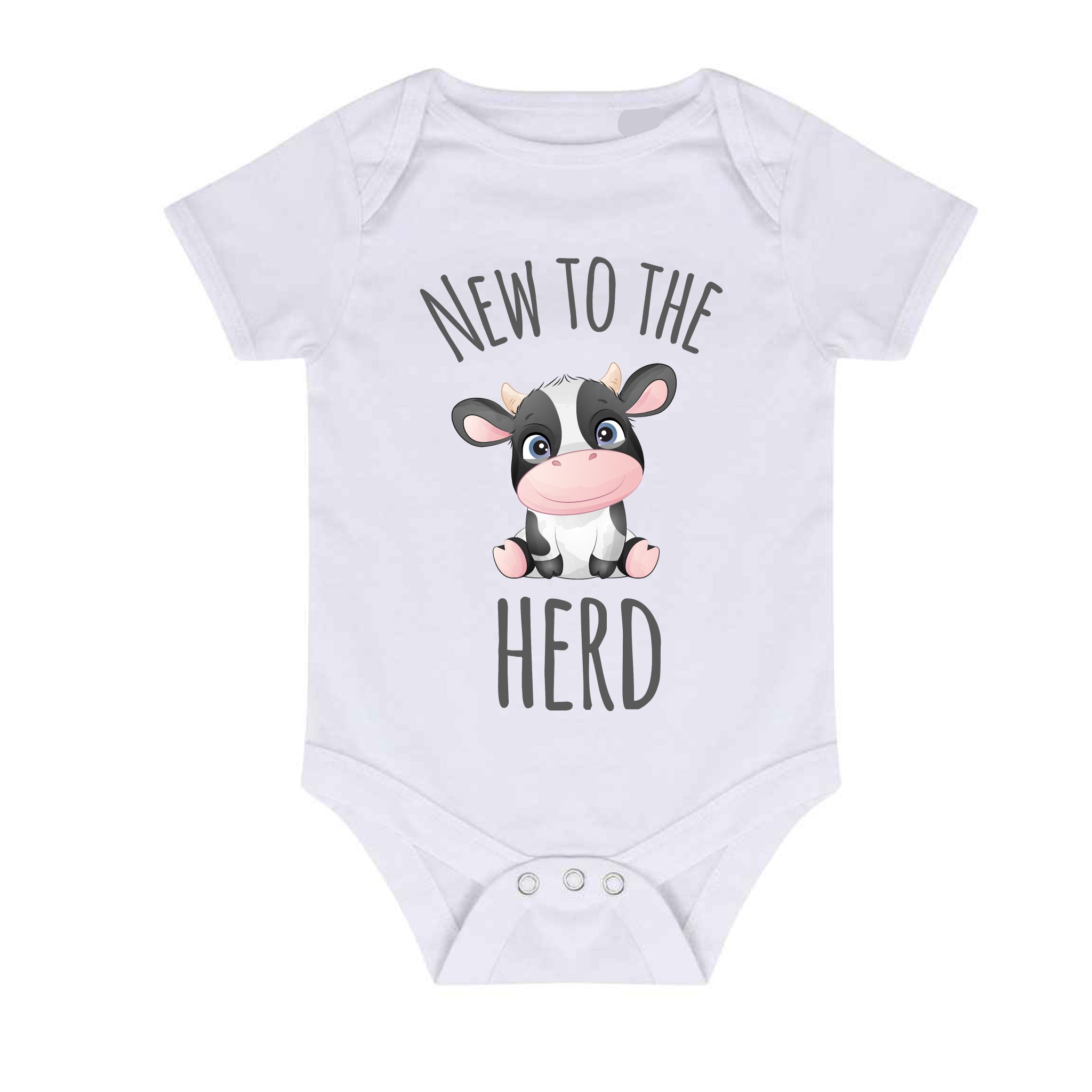 Infant white bodysuit with a cheerful cow illustration and the words 'New to the Herd' printed on the front.