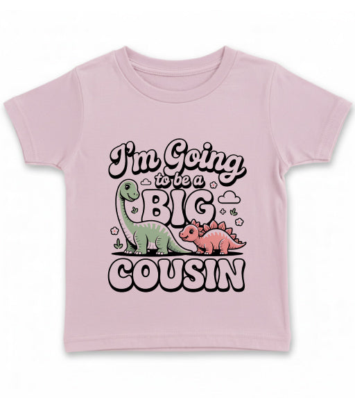 Pink t-shirt with dinosaur graphics and text on a white background